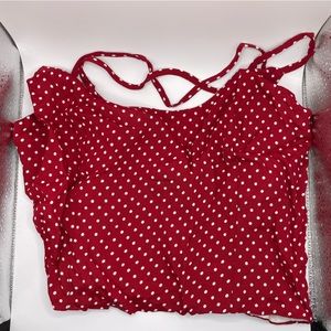 Red cropped tank top with white polka dots
